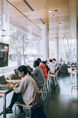 A group of people working together on computers