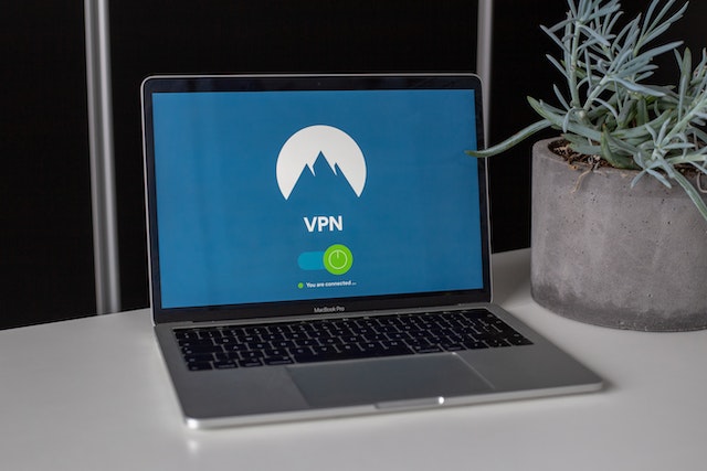 A photo of a laptop with a VPN sign