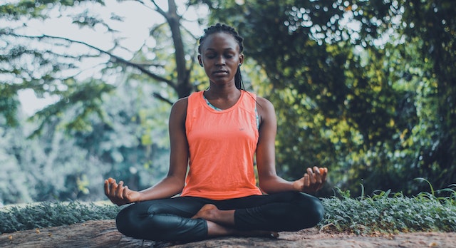 Black woman meditating