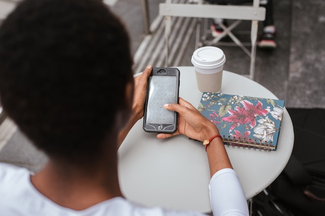 A person checking their phone notifications