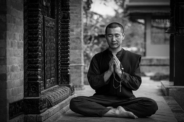 a man praticing yogasana