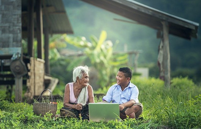 Two people studying through computer