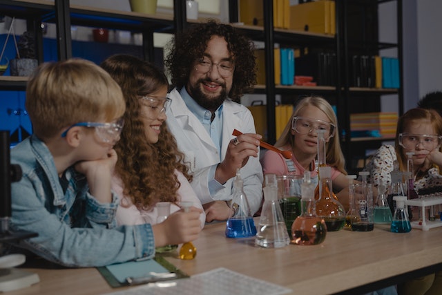 A teacher teaching his students