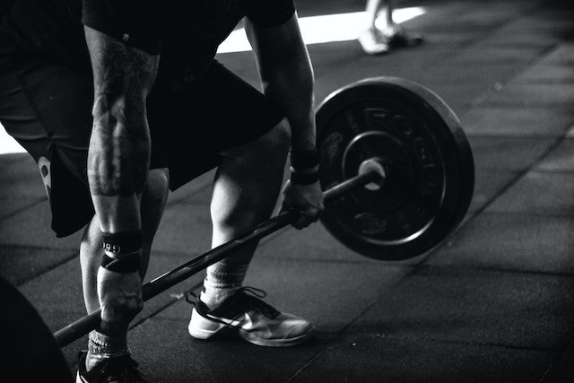 A person doing deadlifts