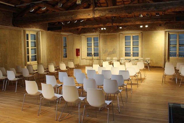 A room for conference with white chairs