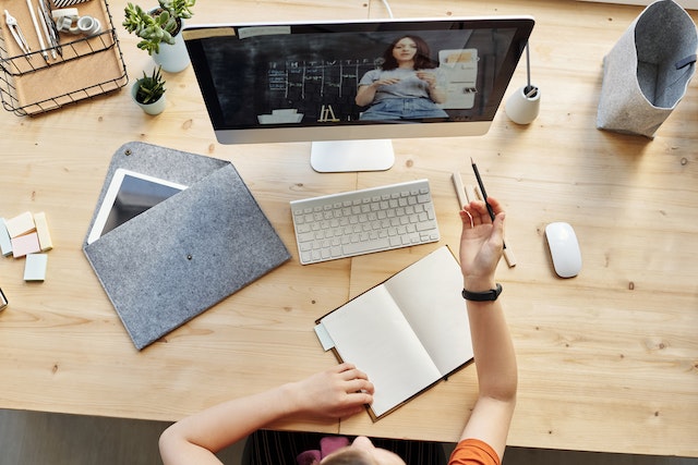 a person studying in their desktop