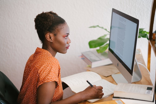 a person reading from their desktop