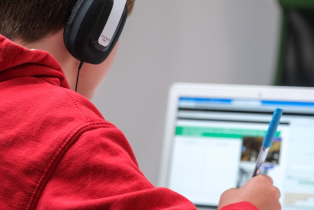 A person learning in front of laptop