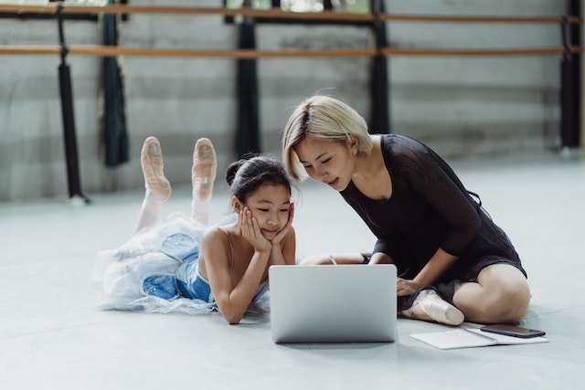 mother and child learning dance