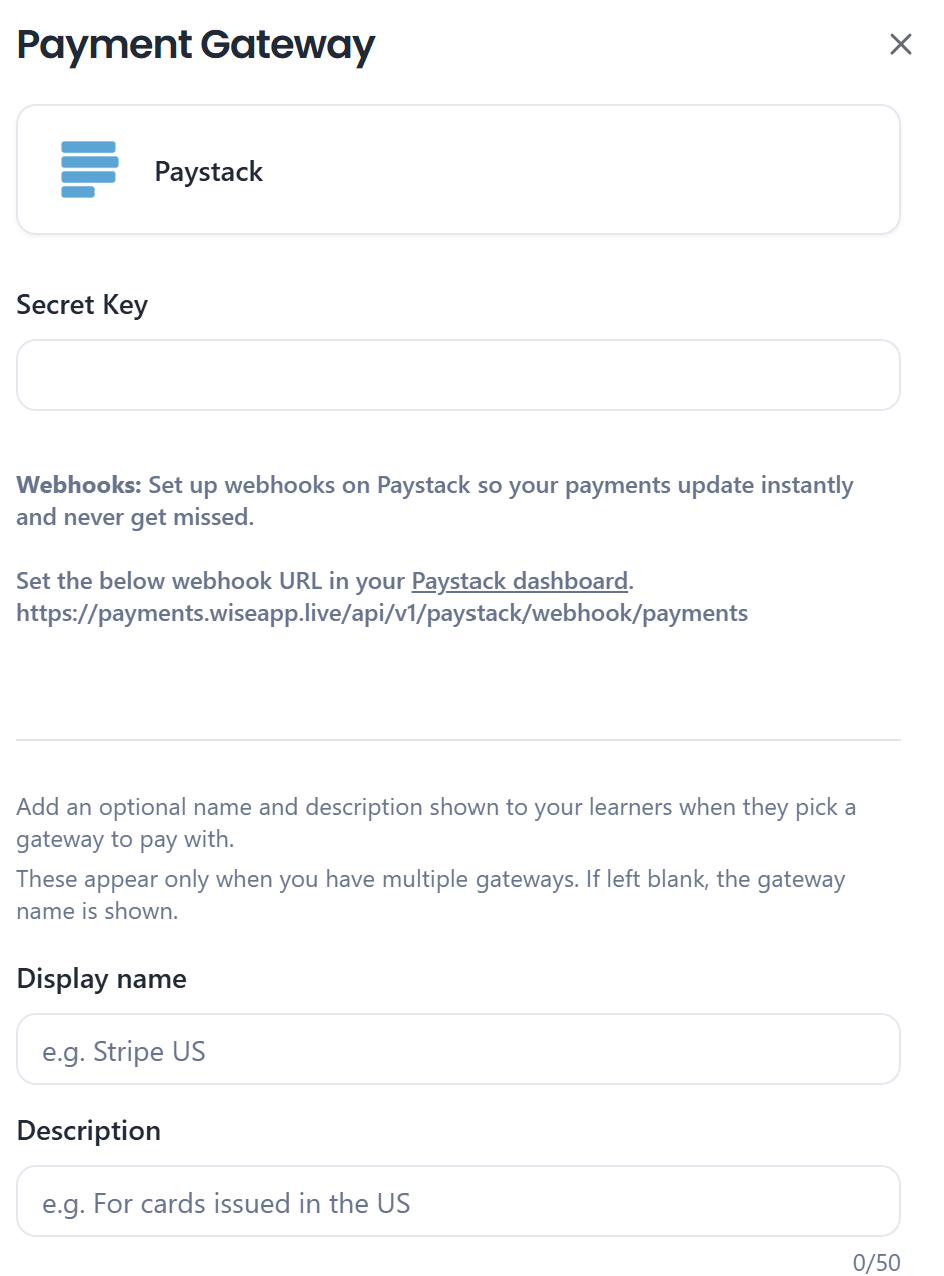 Paystack connection form showing a Secret Key field and webhook setup instructions